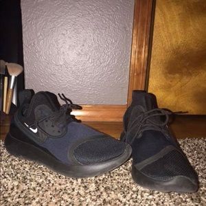 Women’s navy blue Nike’s